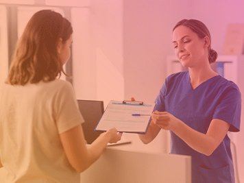 female doctor or nurse with clipboard and patient at hospital