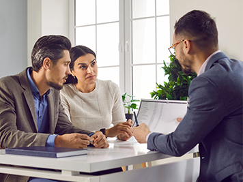 People meeting with their financial advisor
