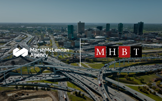 MHBT logo city and highway background