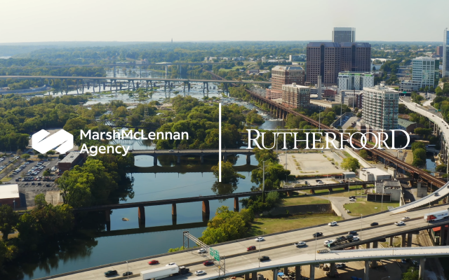 Rutherfoord logo over a city background